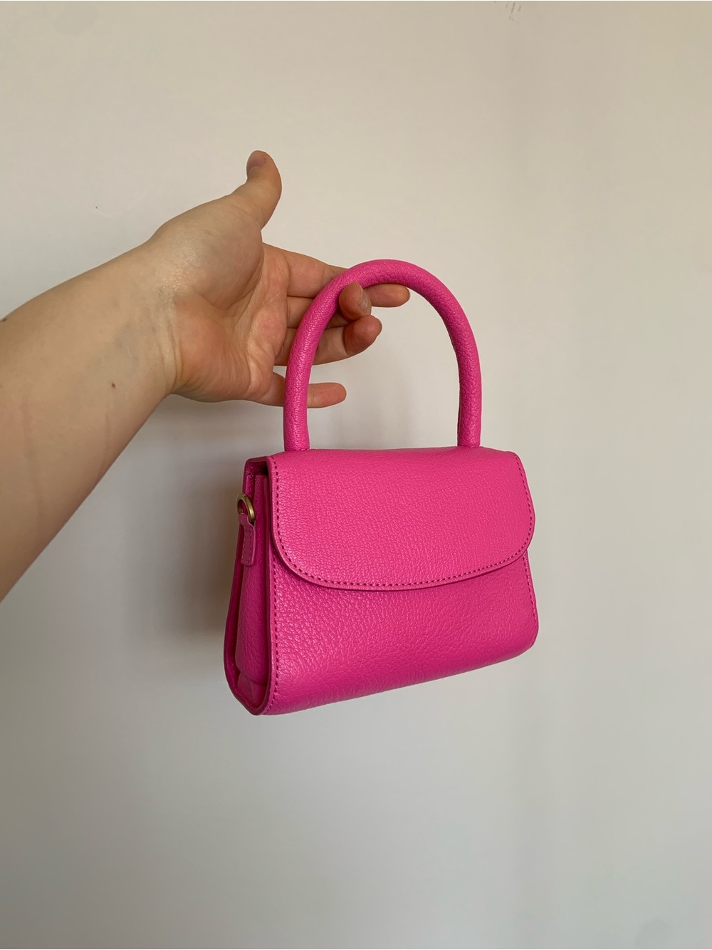 Pink leather handbag